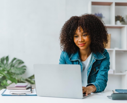 Person using laptop in office