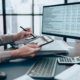 Investors working on desk office and use tablet to check tracking cost